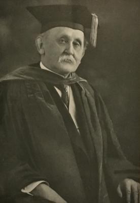 Photograph of Frank Baker in academic regalia