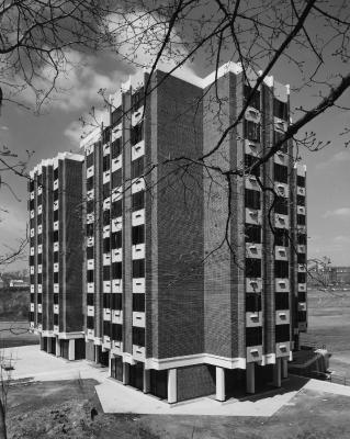 Black and white image of Harbin Hall in 1965 showing the building's nine floors and unique geometric shape as a result of its cluster organization.