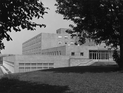 Black and white image of New South in 1959, showing the building's exterior and main entrance.