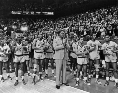 Image of Coach Thompson and his team applauding Villanova after the 1985 championship game