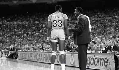 Ewing (33) receives coaching from Thompson during the 1984 championship game