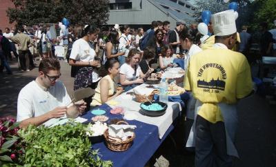 Students enjoying outdoor lunch on Georgetown Day. May 3, 2000