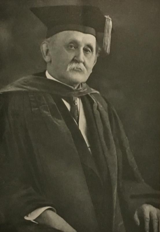 Photograph of Frank Baker in academic regalia