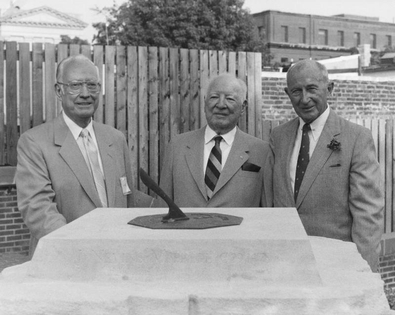 Joseph E. Beh (F'41), Eugene P. McCahill (C'21, G'22, H'55) and J. Nevins McBride (C'29, H'78) behind the sundial that was unveiled as a monument to them in Alumni Square at Georgetown University