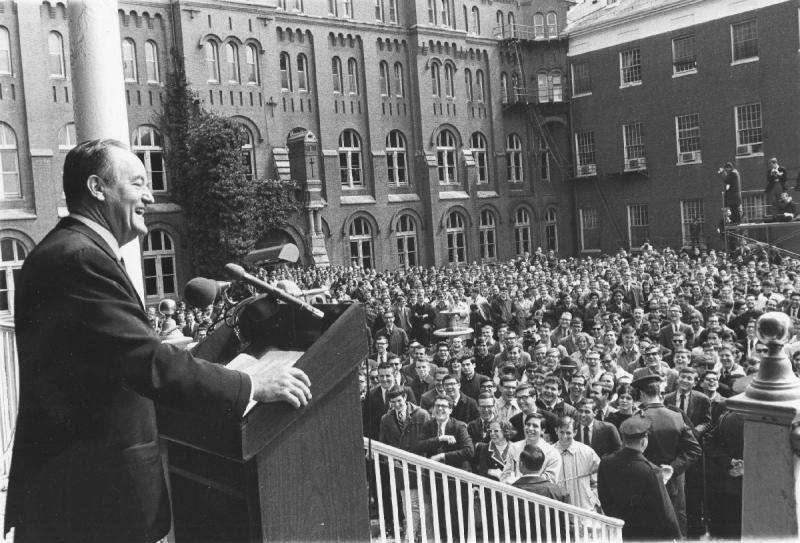 Vice President Hubert Humphrey speaks from the porch of the Old North Building at Georgetown University on Founders' Day, 1966-03-25